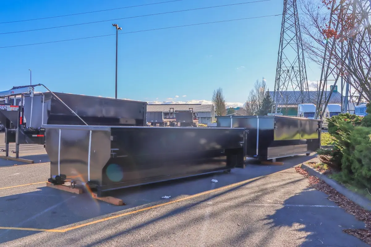 Roll-off dumpster ready for waste disposal at job site for Construction Dumpster Rental in Groton